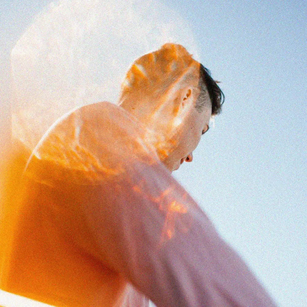 person wearing pink shirt with sun glares - brand development by better brands co.